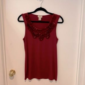 Ivos burgundy red tank top with ribbon work on the front.